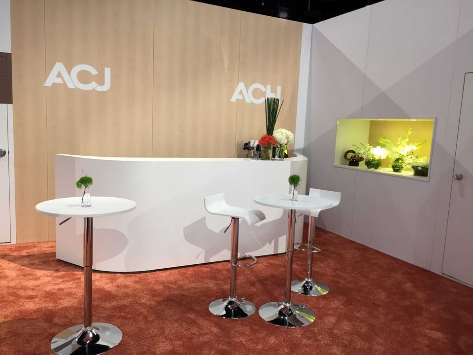 Carpeted trade show booth flooring designed by BTWN Exhibits at NBAA 2017.