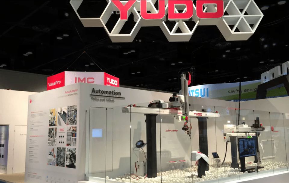 Example of a creative stunt at a trade show by the company Yudo.