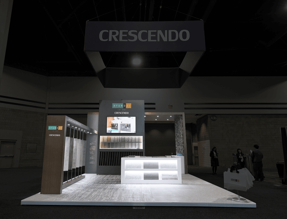 Strategic lighting in our custom trade show display for Hyundai L&C.