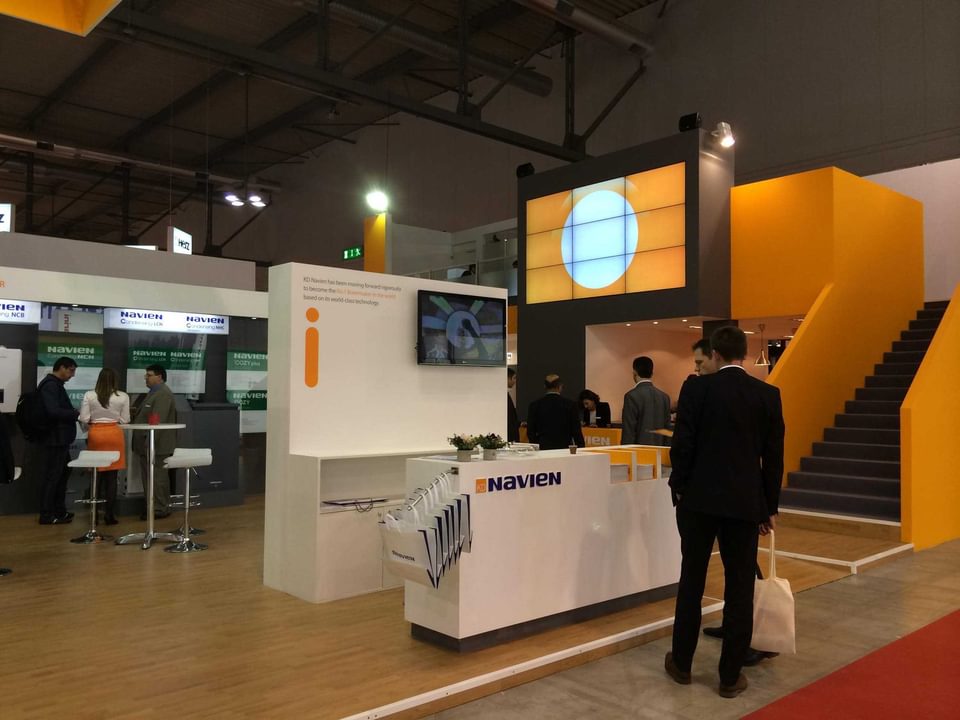 Strategic storage within a trade show booth counter designed by BTWN Exhibits.